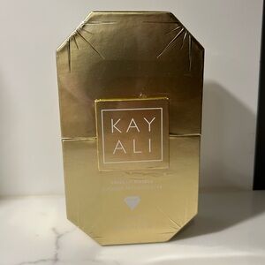 KAYALI Vanilla Royale Sugared Patchouli | 64 Eau de Parfum sprayed 1 time
